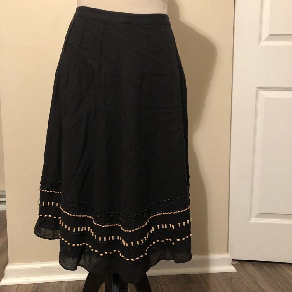 Caslon skirt with‎ beading accent at bottom